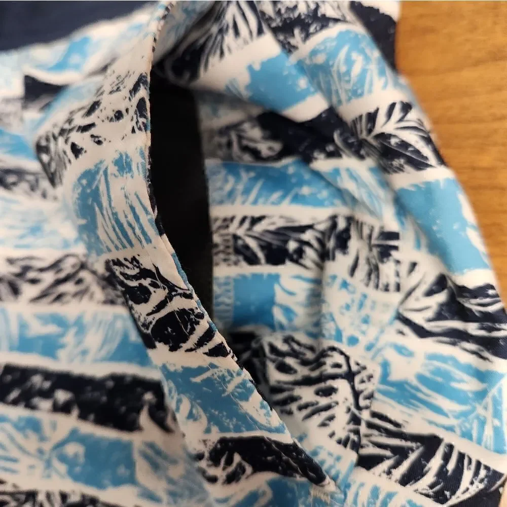 NWT Bass Pro Shops XL blue and palm leaf swim trunks.
